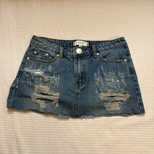 Blue ripped mini skirt